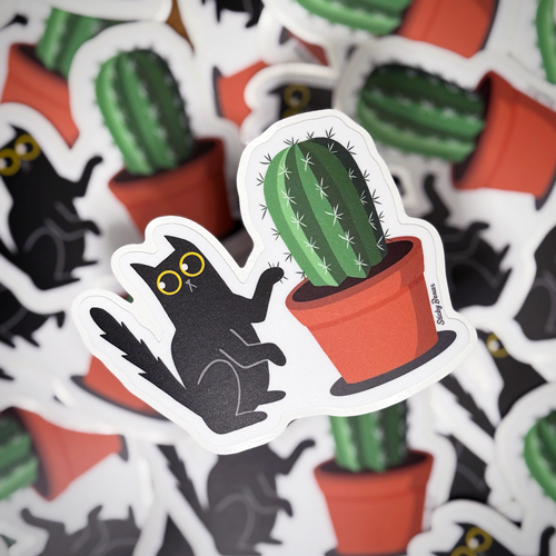 Black cat and cactus
