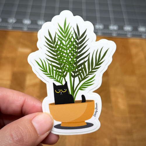 Black cat and palm